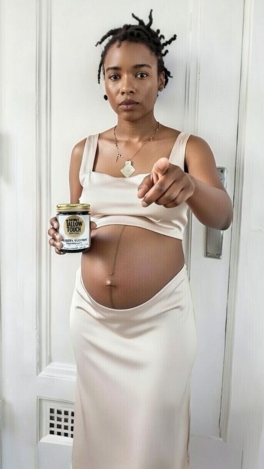  Pregnant woman in Harlem apartment holding Nature’s Tallow Touch Mother’s Recovery Body Cream